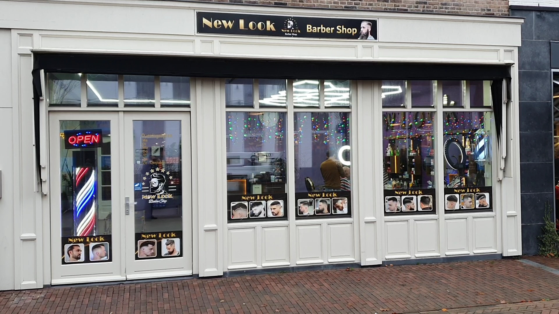 De gevel van New Look Barber Shop aan de Nieuwe Es in Sleeuwijk